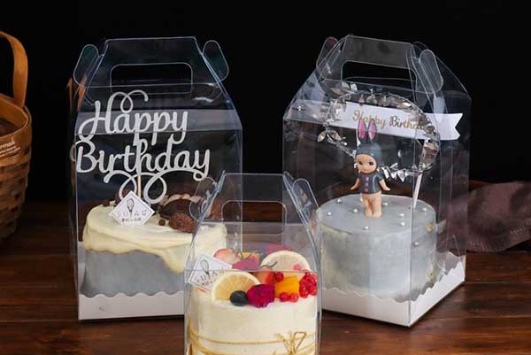 Premium Photo | Transparent round cake box a universal transparent box tube  tube in which the dessert looks